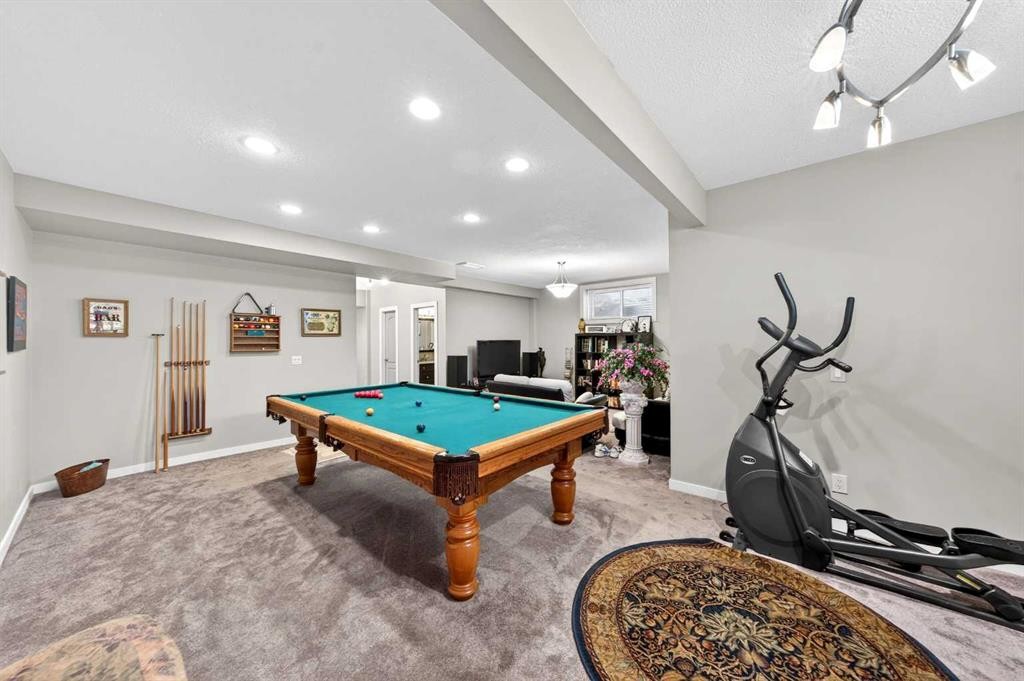 27 Panatella Row Nw, Calgary, AB - Indoor Photo Showing Other Room