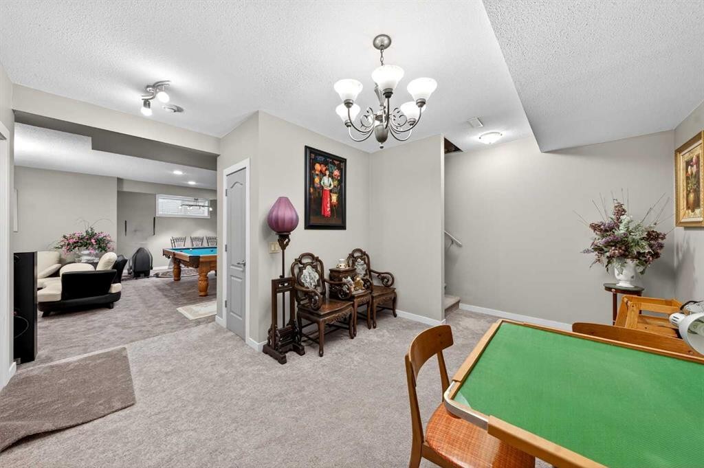 27 Panatella Row Nw, Calgary, AB - Indoor Photo Showing Other Room
