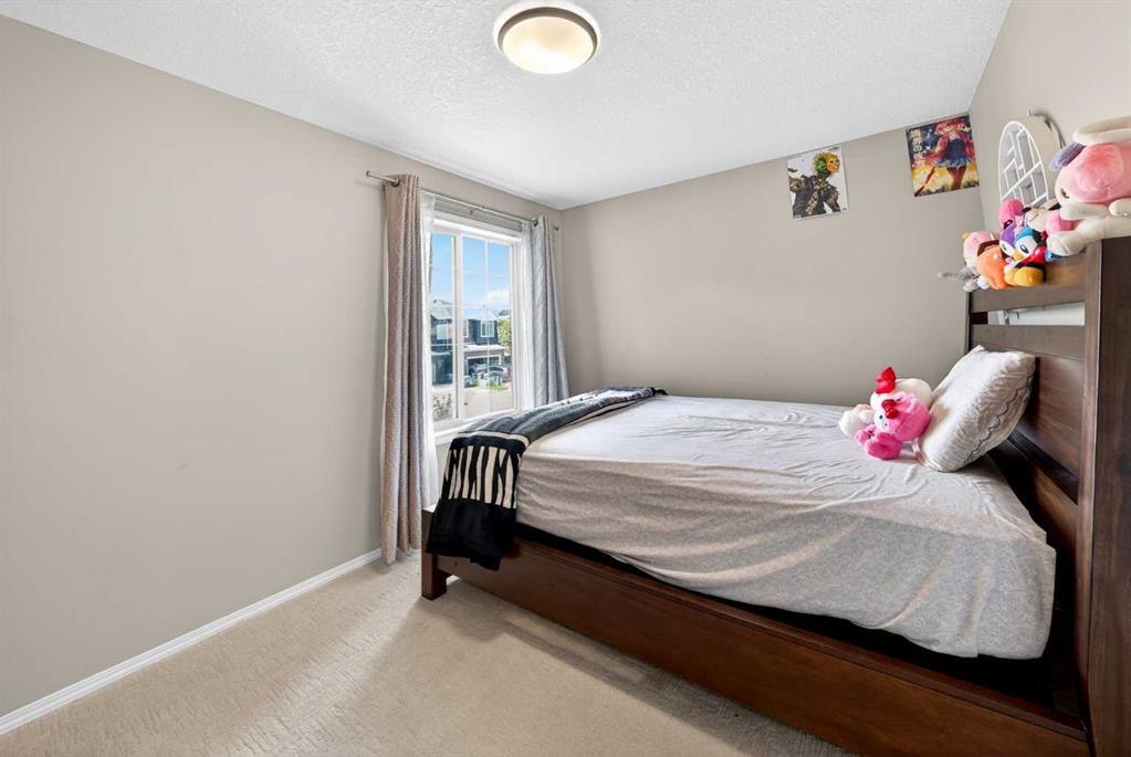 86 Nolanshire Crescent Nw, Calgary, AB - Indoor Photo Showing Bedroom