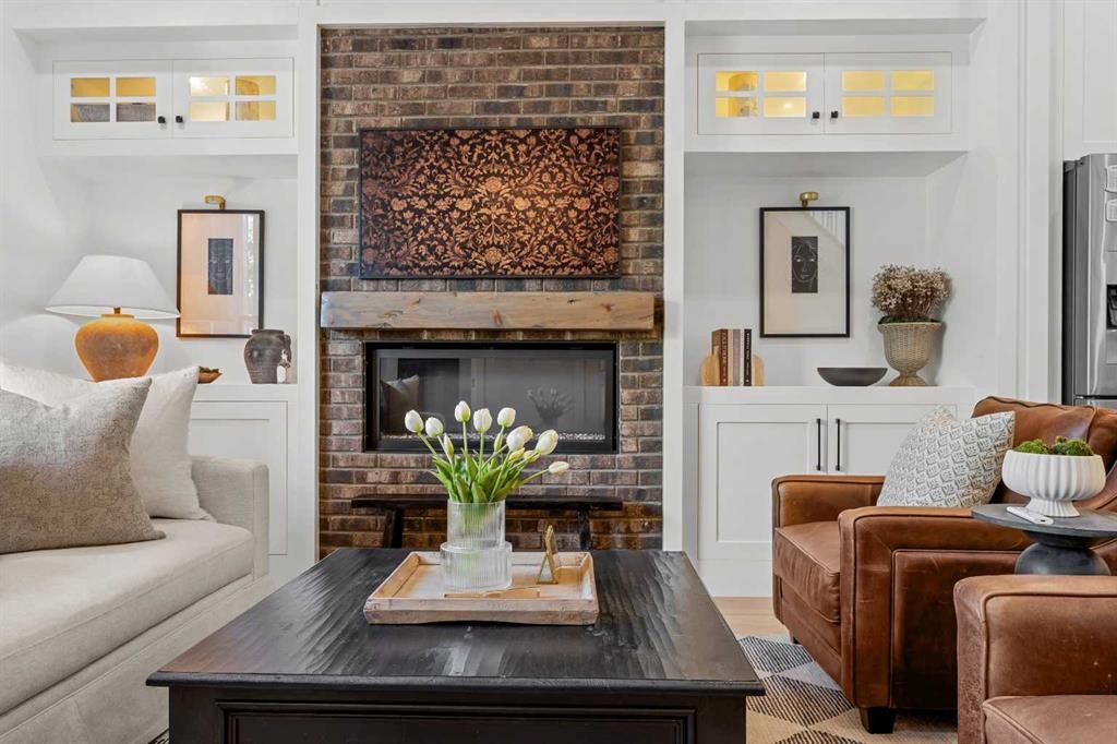 2012 49 Avenue Sw, Calgary, AB - Indoor Photo Showing Living Room With Fireplace