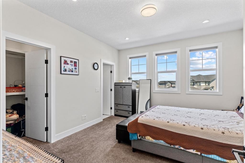 129 Marina Key, Chestermere, AB - Indoor Photo Showing Bedroom