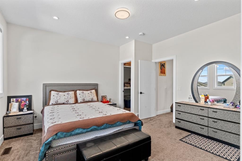129 Marina Key, Chestermere, AB - Indoor Photo Showing Bedroom