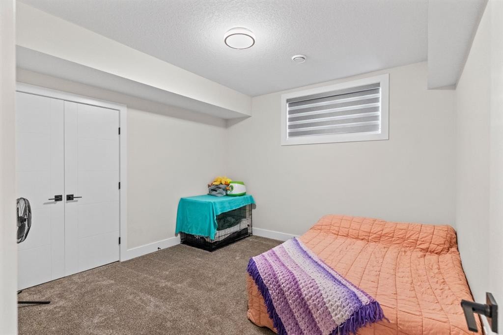 129 Marina Key, Chestermere, AB - Indoor Photo Showing Bedroom