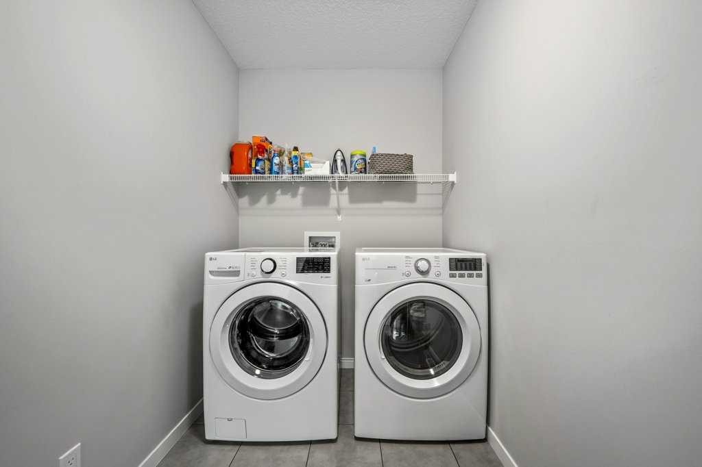 114 Crestbrook Way Sw, Calgary, AB - Indoor Photo Showing Laundry Room