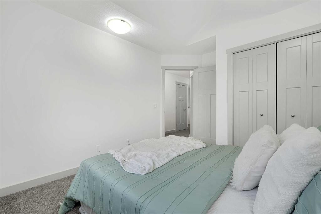 570 Evanston Manor Nw, Calgary, AB - Indoor Photo Showing Bedroom