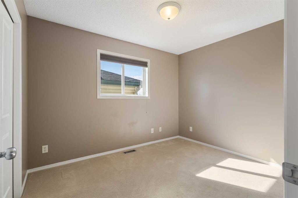 13 Tuscany Springs Circle Nw, Calgary, AB - Indoor Photo Showing Other Room
