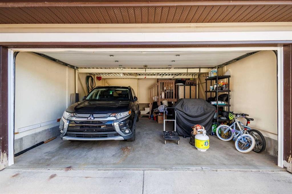 13 Tuscany Springs Circle Nw, Calgary, AB - Indoor Photo Showing Garage