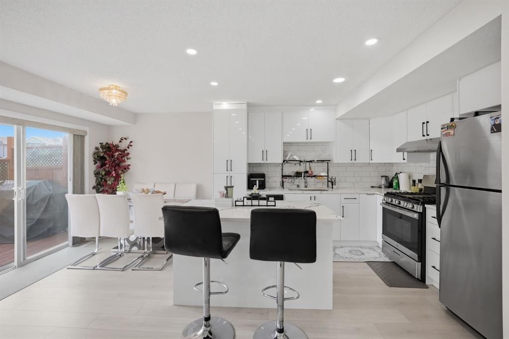 54 Saddlecreek Crescent Ne, Calgary, AB - Indoor Photo Showing Kitchen With Stainless Steel Kitchen With Upgraded Kitchen