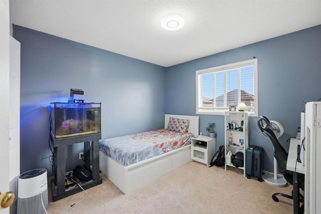 54 Saddlecreek Crescent Ne, Calgary, AB - Indoor Photo Showing Bedroom
