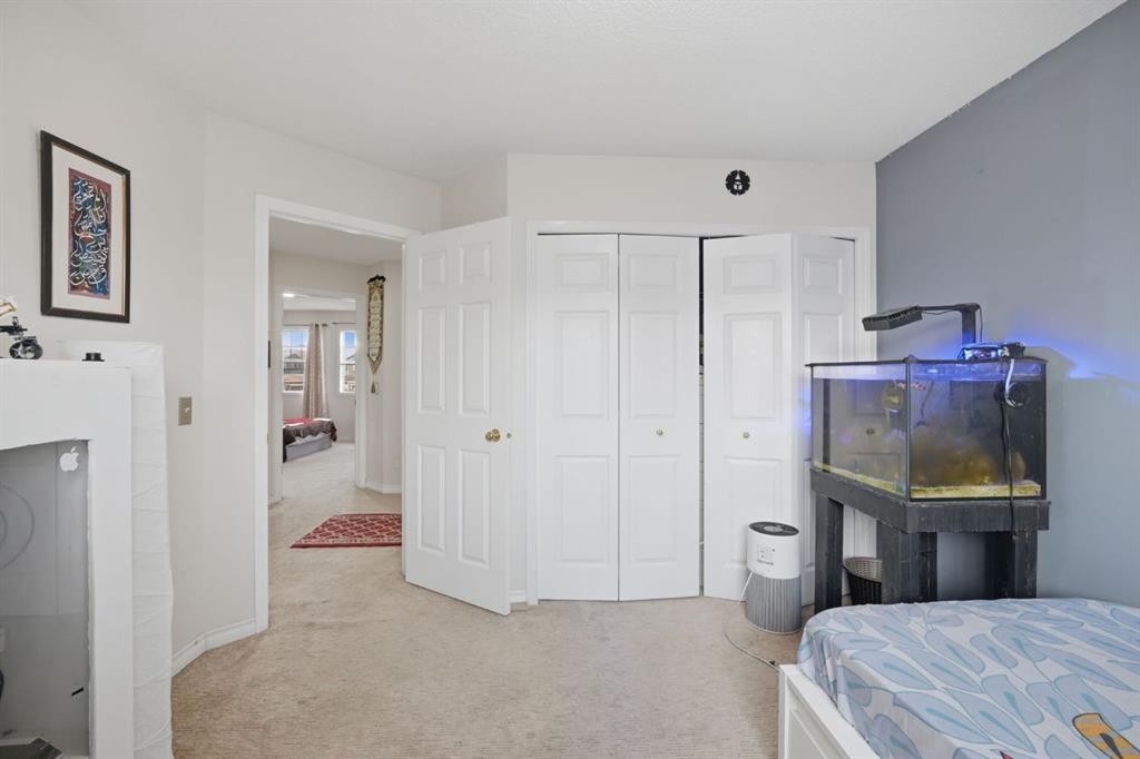 54 Saddlecreek Crescent Ne, Calgary, AB - Indoor Photo Showing Bedroom