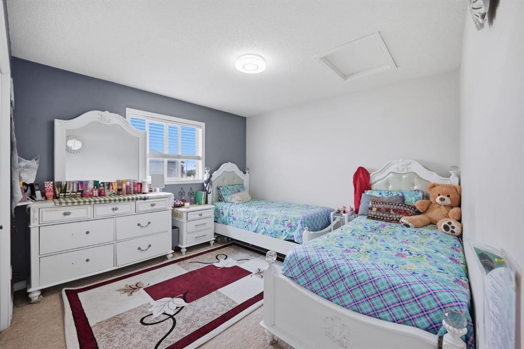 54 Saddlecreek Crescent Ne, Calgary, AB - Indoor Photo Showing Bedroom