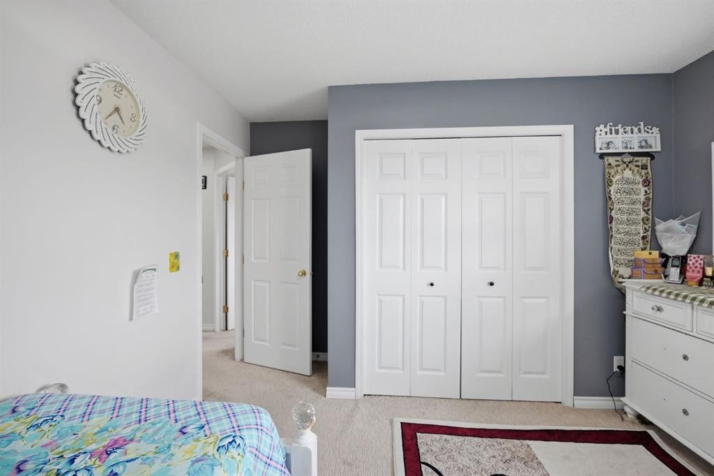 54 Saddlecreek Crescent Ne, Calgary, AB - Indoor Photo Showing Bedroom