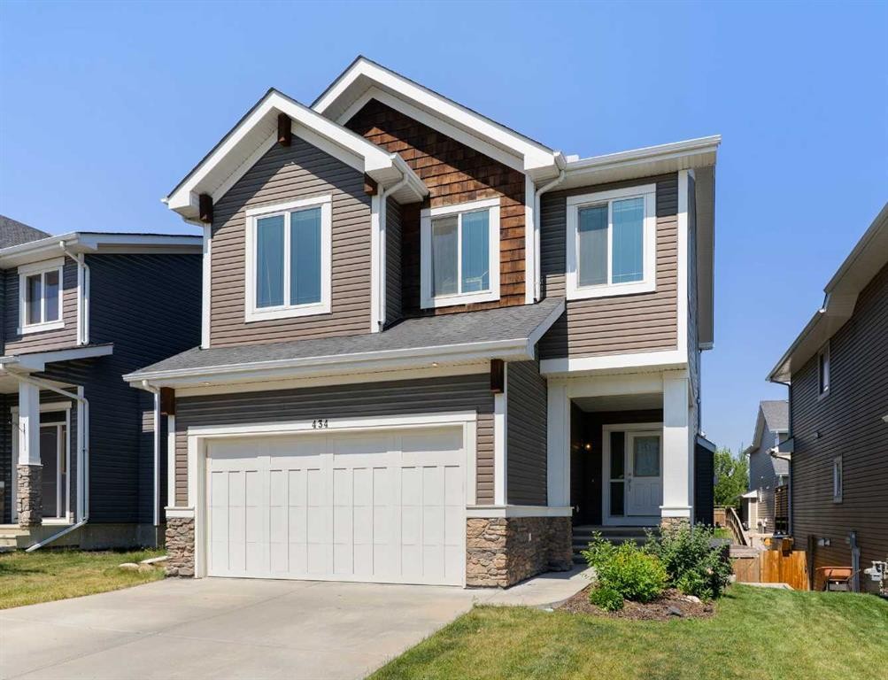434 River Heights Drive, Cochrane, AB - Outdoor With Facade