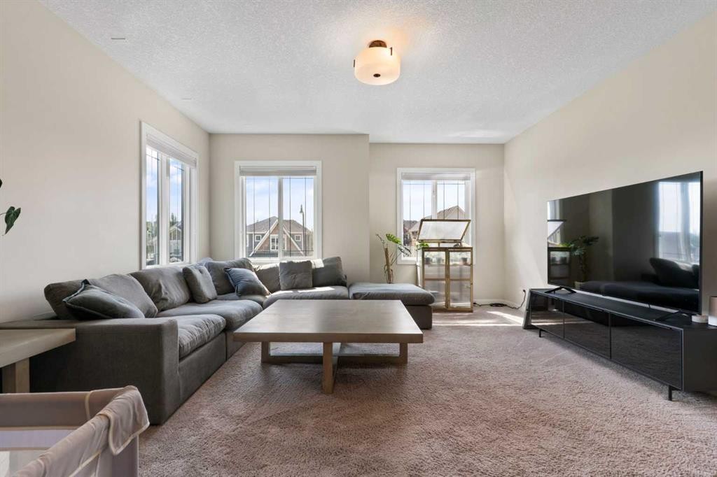 434 River Heights Drive, Cochrane, AB - Indoor Photo Showing Living Room