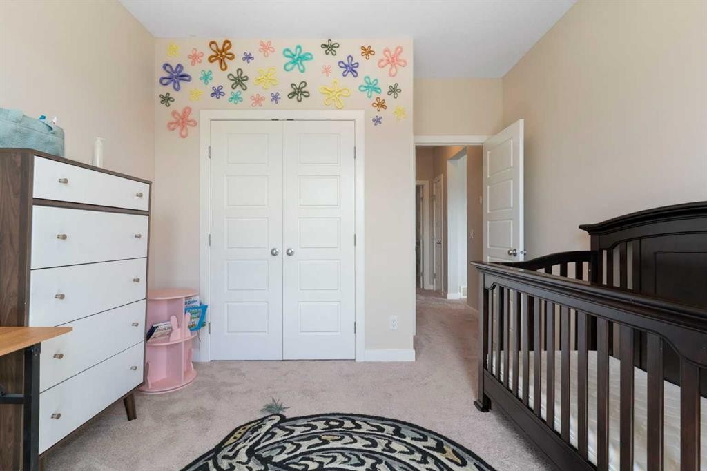 434 River Heights Drive, Cochrane, AB - Indoor Photo Showing Bedroom