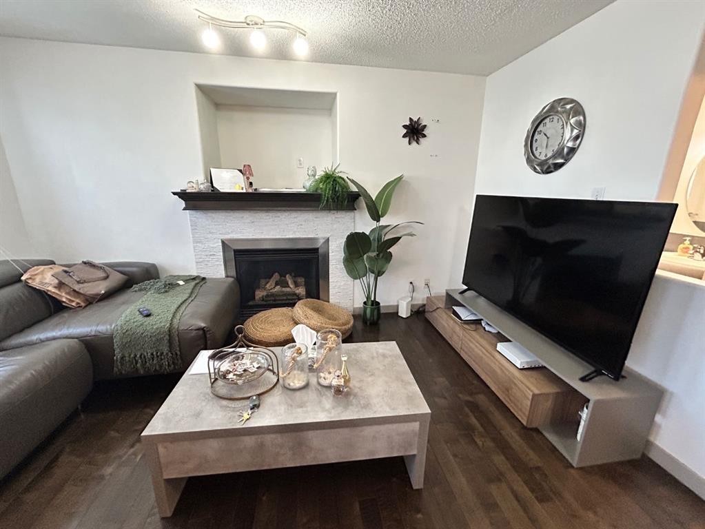 86 Covepark Road, Calgary, AB - Indoor Photo Showing Living Room With Fireplace