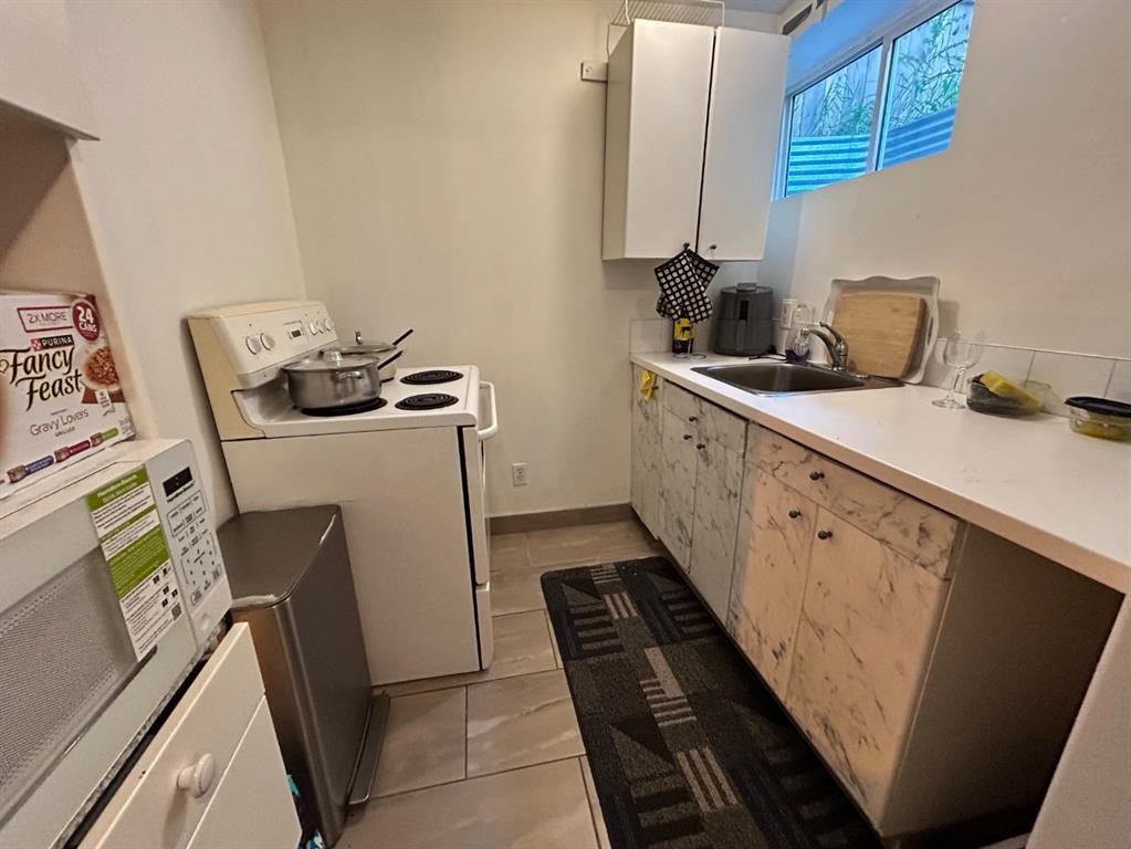 86 Covepark Road, Calgary, AB - Indoor Photo Showing Laundry Room