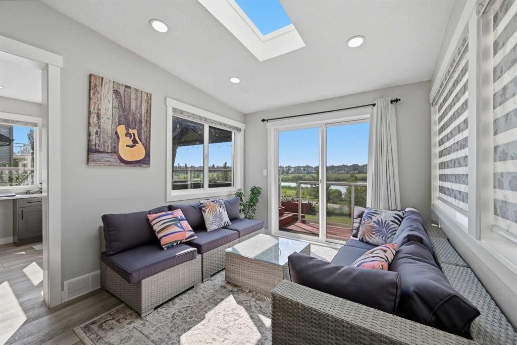 760 Saddlecreek Way Ne, Calgary, AB - Indoor Photo Showing Living Room