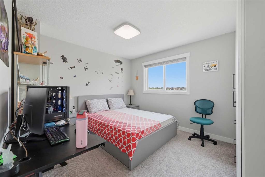 760 Saddlecreek Way Ne, Calgary, AB - Indoor Photo Showing Bedroom