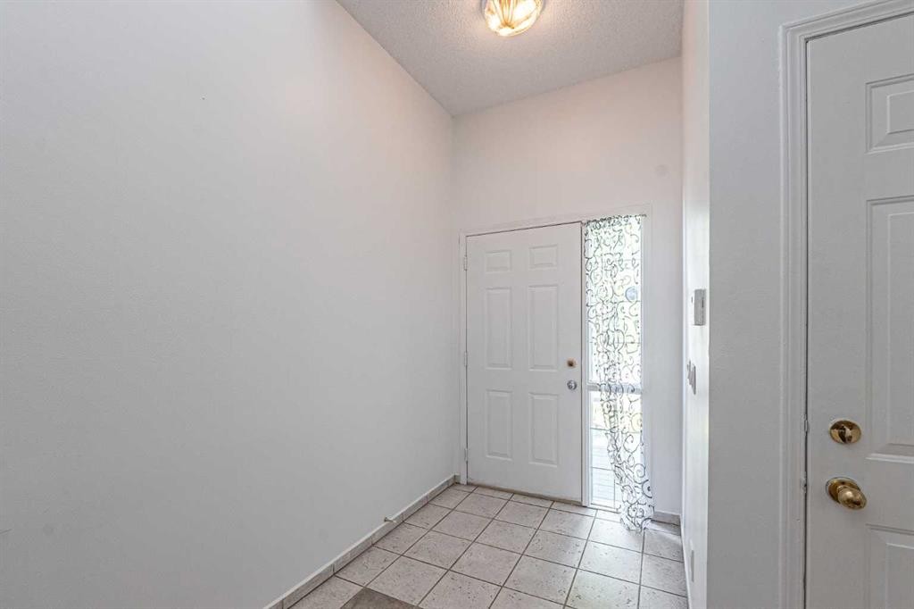 35 Martin Crossing Park Ne, Calgary, AB - Indoor Photo Showing Other Room