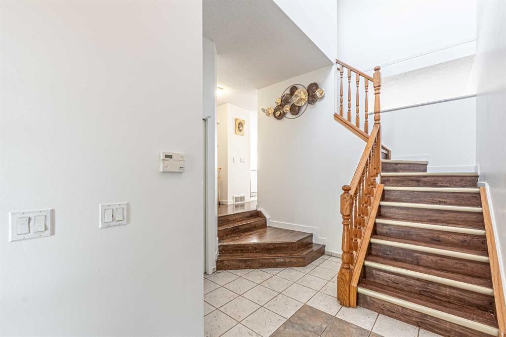 35 Martin Crossing Park Ne, Calgary, AB - Indoor Photo Showing Other Room