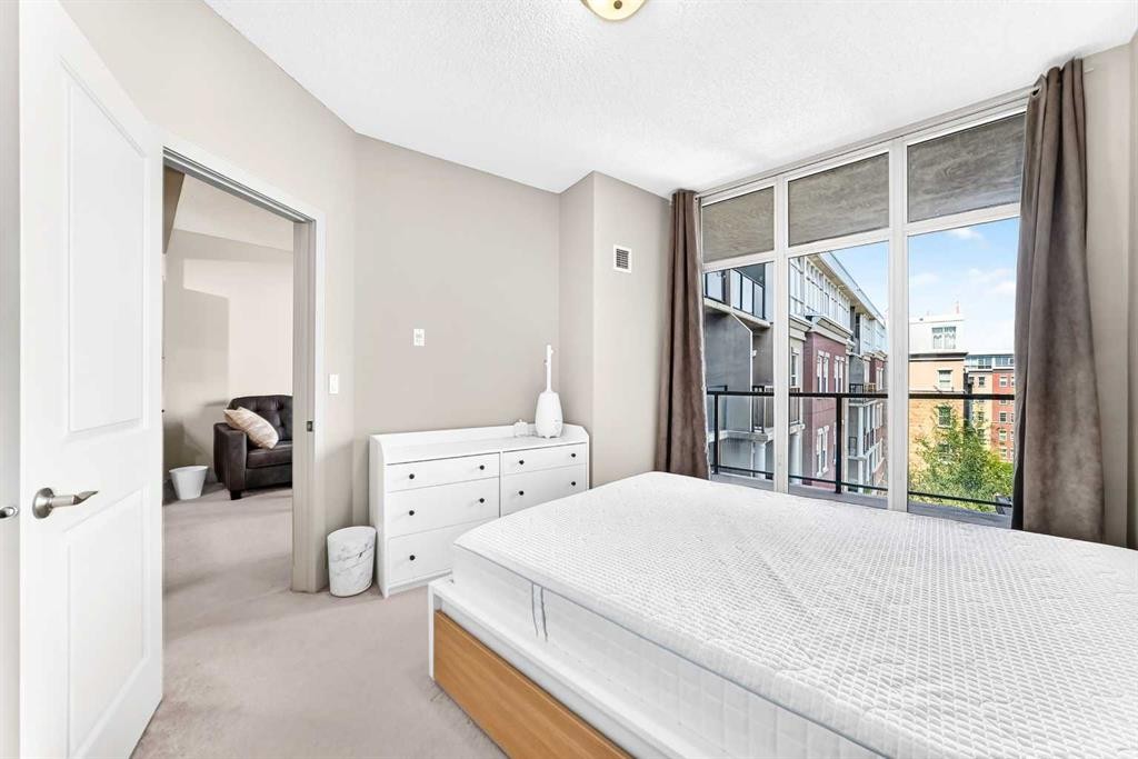 5601-11811 Lake Fraser Drive Se, Calgary, AB - Indoor Photo Showing Bedroom