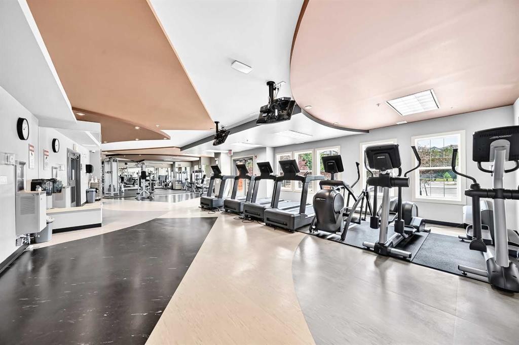 5601-11811 Lake Fraser Drive Se, Calgary, AB - Indoor Photo Showing Gym Room