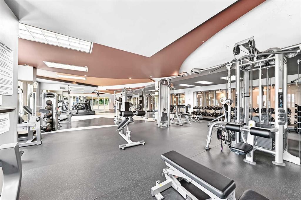5601-11811 Lake Fraser Drive Se, Calgary, AB - Indoor Photo Showing Gym Room