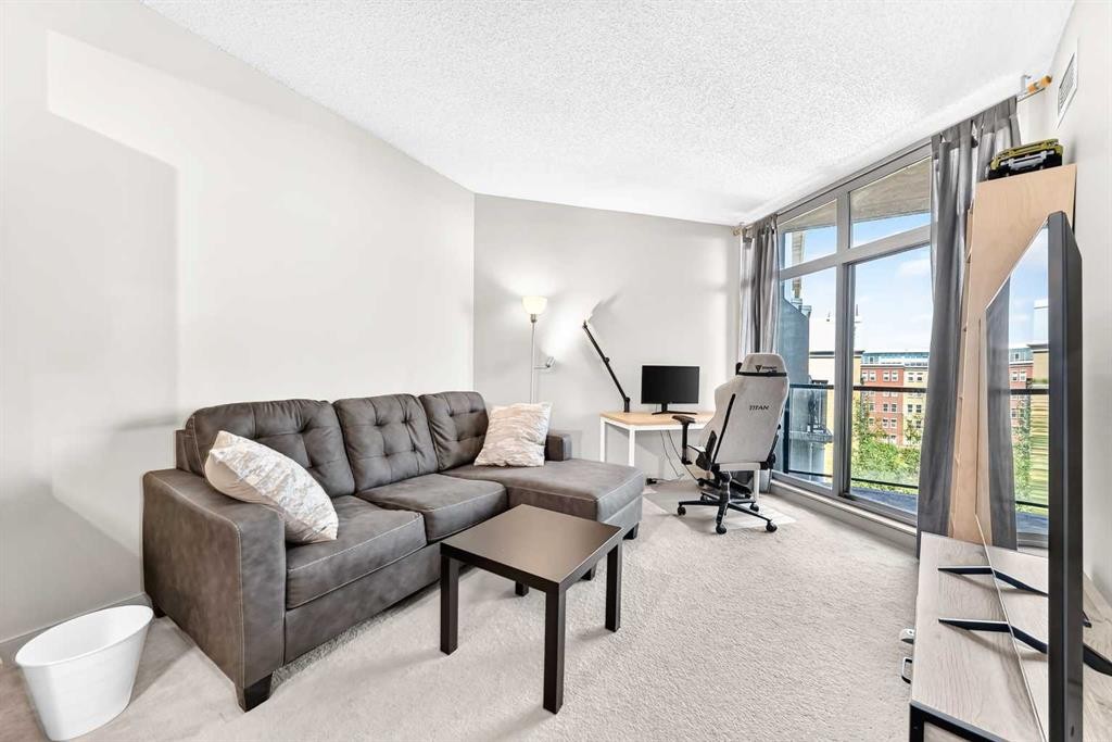 5601-11811 Lake Fraser Drive Se, Calgary, AB - Indoor Photo Showing Living Room