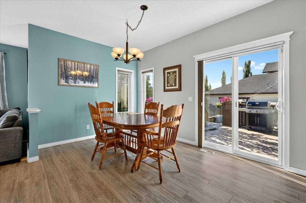 21 Mcintyre Place Nw, Langdon, AB - Indoor Photo Showing Dining Room