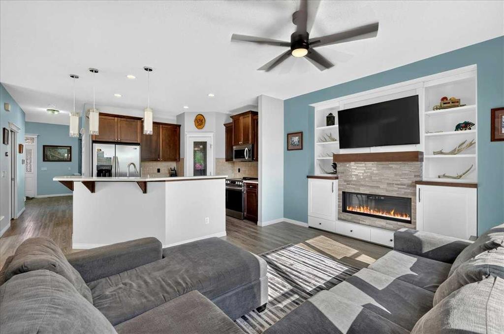 21 Mcintyre Place Nw, Langdon, AB - Indoor With Fireplace