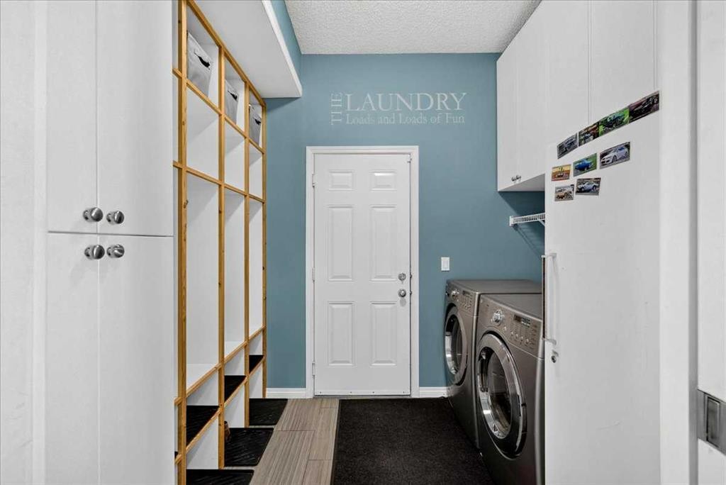 21 Mcintyre Place Nw, Langdon, AB - Indoor Photo Showing Laundry Room