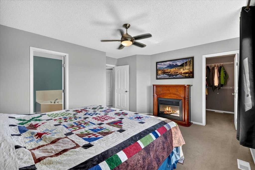 21 Mcintyre Place Nw, Langdon, AB - Indoor Photo Showing Bedroom
