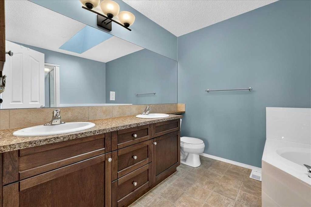 21 Mcintyre Place Nw, Langdon, AB - Indoor Photo Showing Bathroom