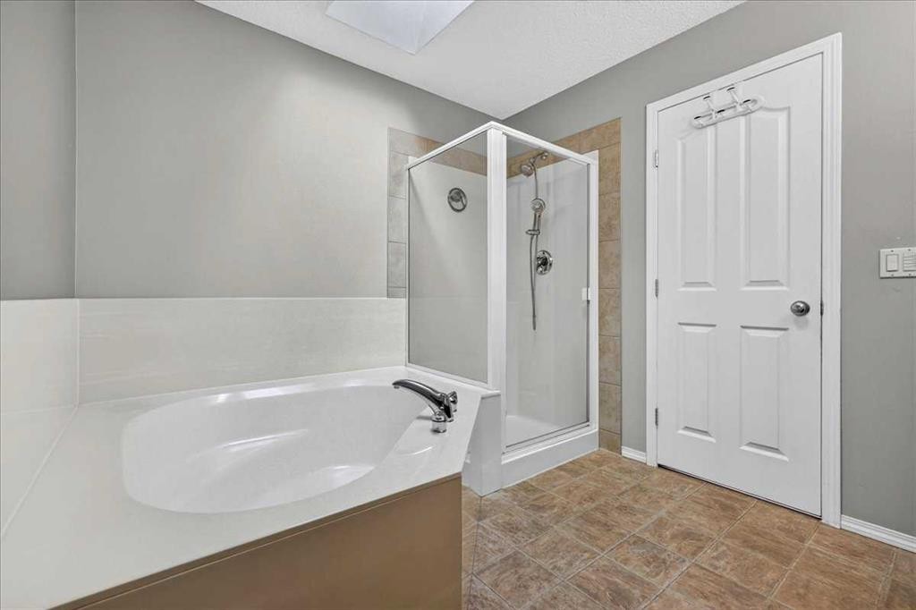 21 Mcintyre Place Nw, Langdon, AB - Indoor Photo Showing Bathroom