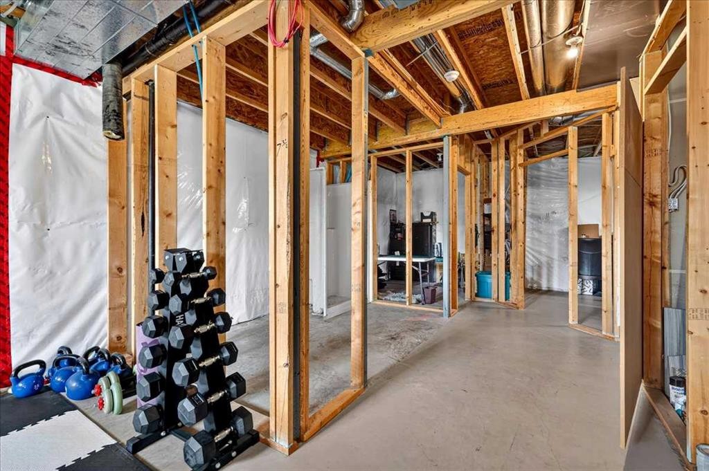 21 Mcintyre Place Nw, Langdon, AB - Indoor Photo Showing Basement