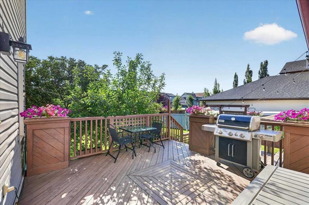 21 Mcintyre Place Nw, Langdon, AB - Outdoor With Deck Patio Veranda With Exterior