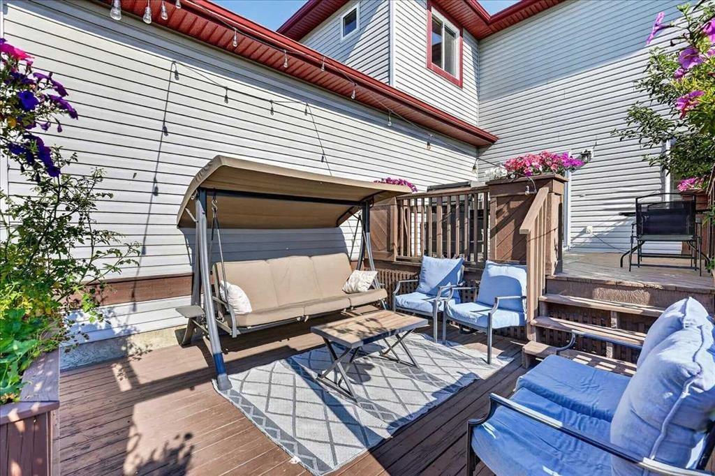 21 Mcintyre Place Nw, Langdon, AB - Outdoor With Deck Patio Veranda With Exterior