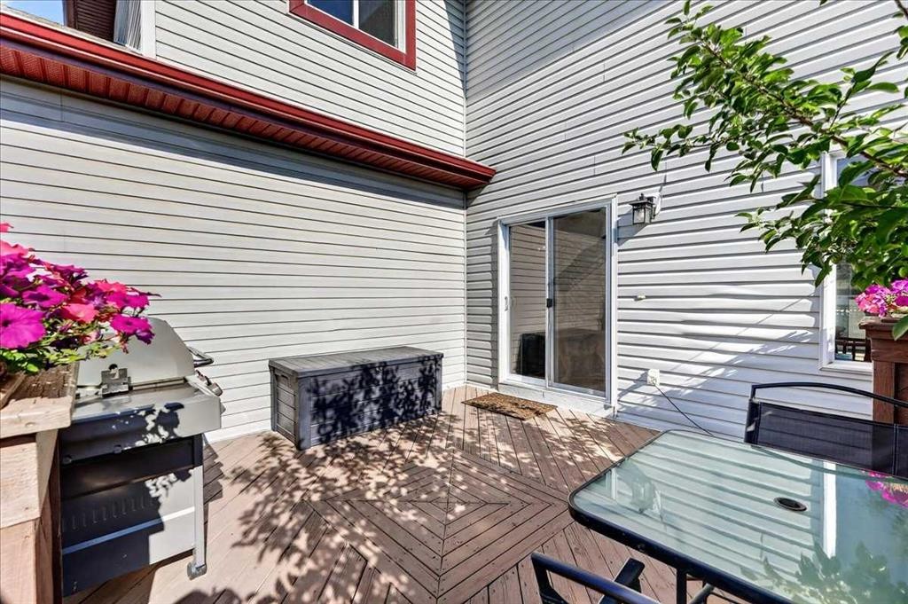 21 Mcintyre Place Nw, Langdon, AB - Outdoor With Deck Patio Veranda With Exterior