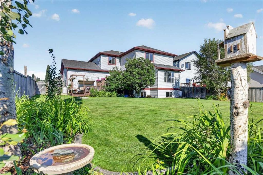 21 Mcintyre Place Nw, Langdon, AB - Outdoor With Deck Patio Veranda