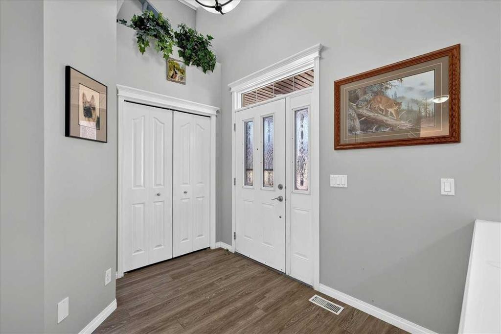 21 Mcintyre Place Nw, Langdon, AB - Indoor Photo Showing Other Room
