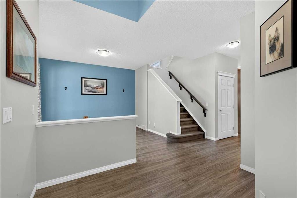 21 Mcintyre Place Nw, Langdon, AB - Indoor Photo Showing Other Room