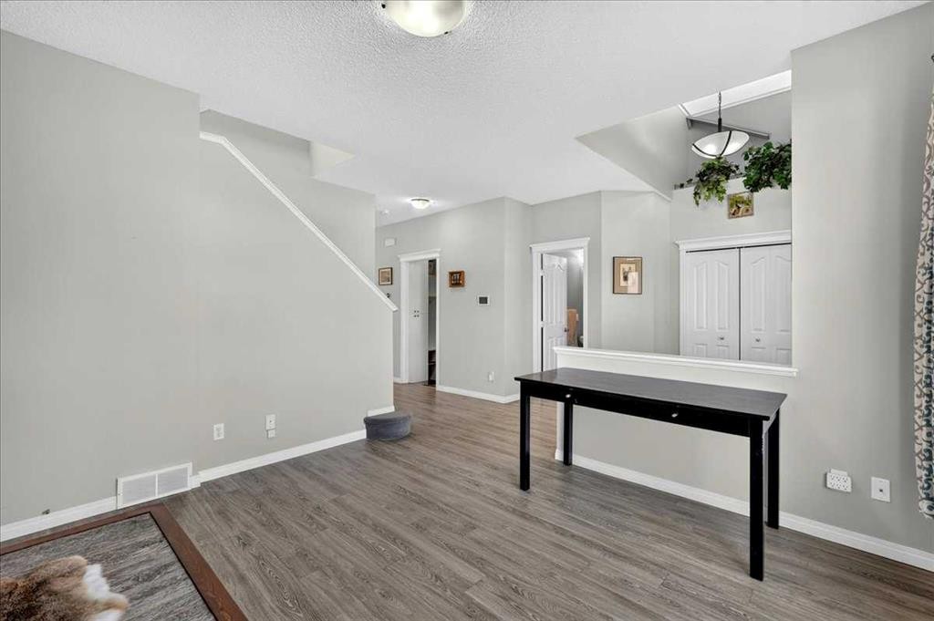21 Mcintyre Place Nw, Langdon, AB - Indoor Photo Showing Other Room
