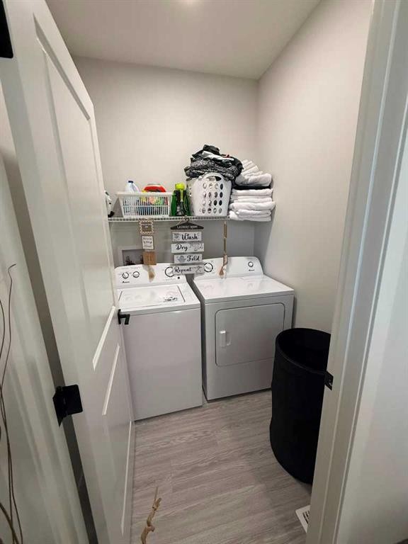 41 Edith Gate Nw, Calgary, AB - Indoor Photo Showing Laundry Room