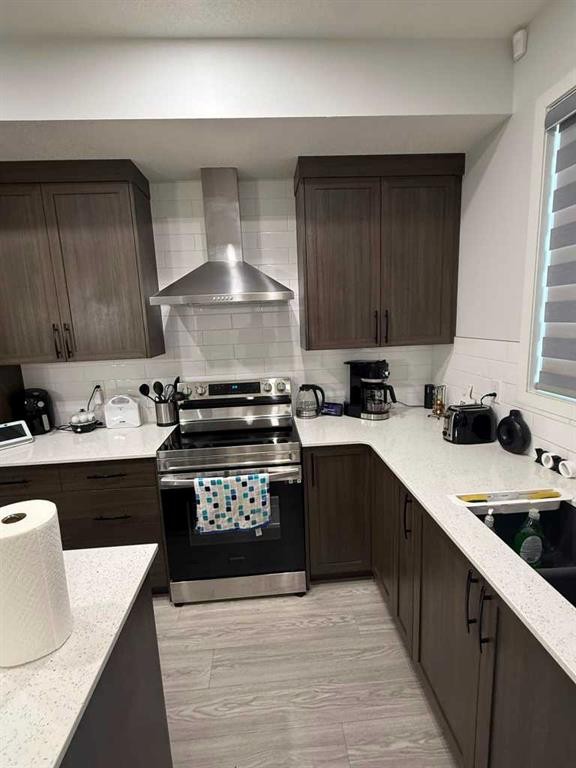 41 Edith Gate Nw, Calgary, AB - Indoor Photo Showing Kitchen With Double Sink