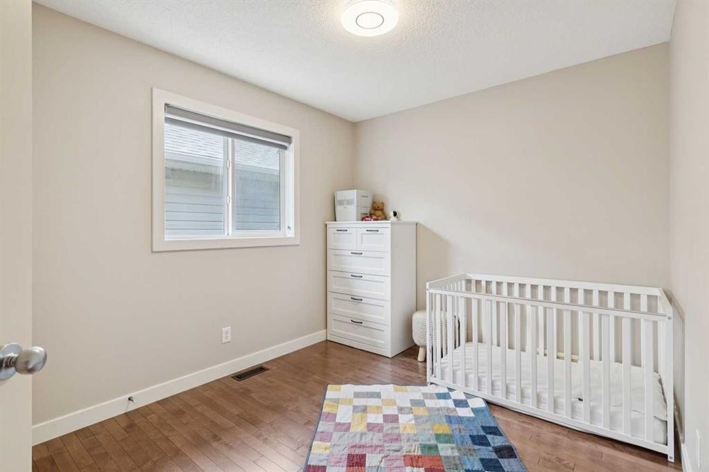 36 Cranwell Green Se, Calgary, AB - Indoor Photo Showing Bedroom