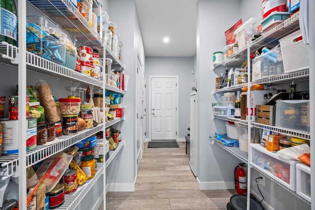 338 Magnolia Way Se, Calgary, AB - Indoor With Storage