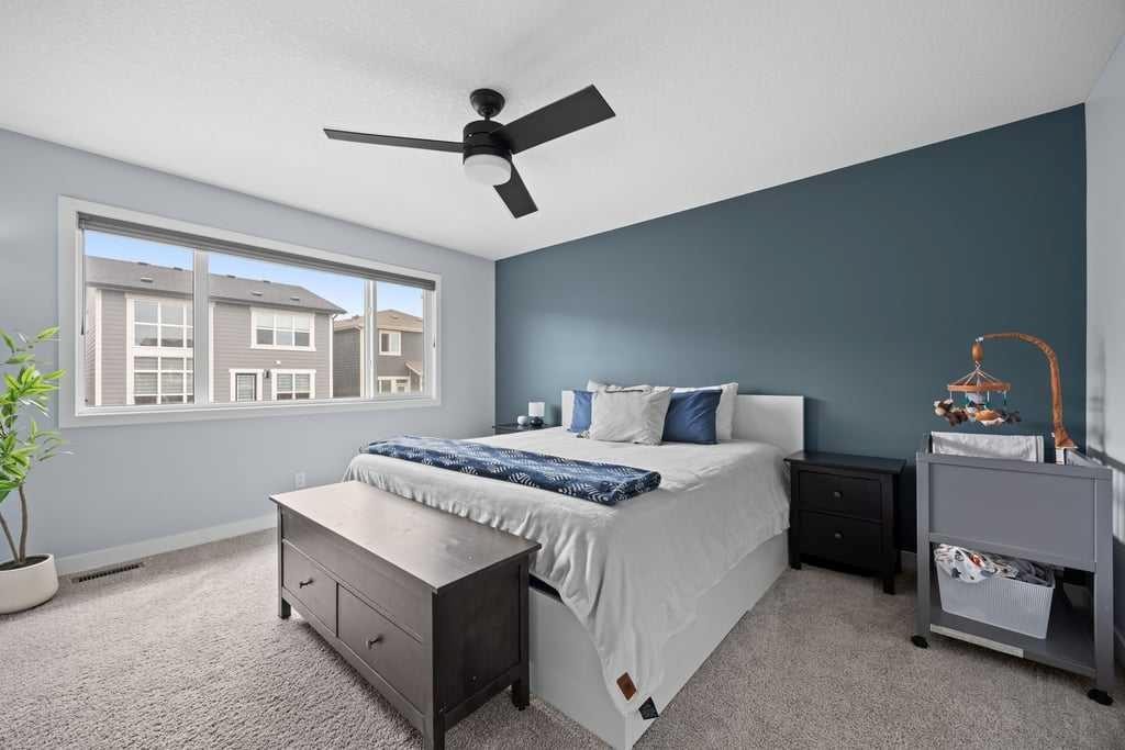 338 Magnolia Way Se, Calgary, AB - Indoor Photo Showing Bedroom