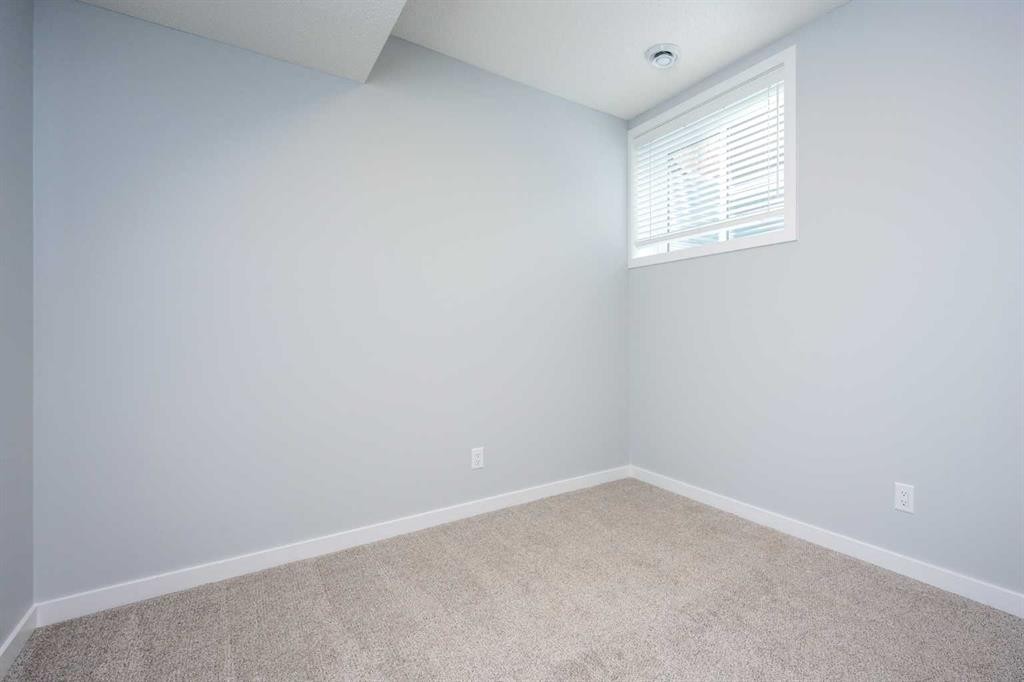 338 Magnolia Way Se, Calgary, AB - Indoor Photo Showing Other Room