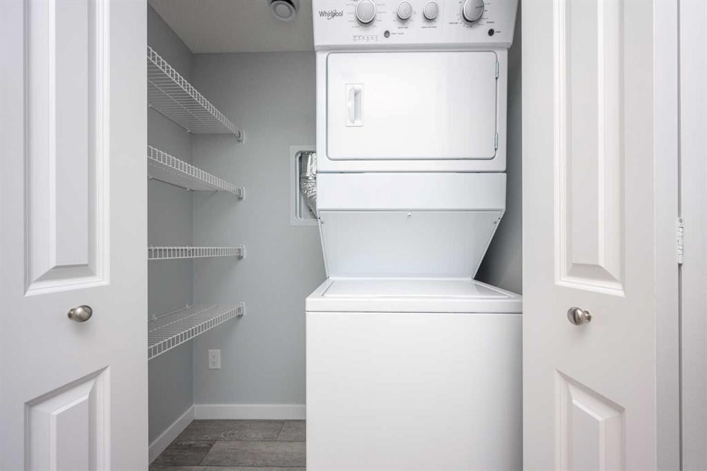 338 Magnolia Way Se, Calgary, AB - Indoor Photo Showing Laundry Room